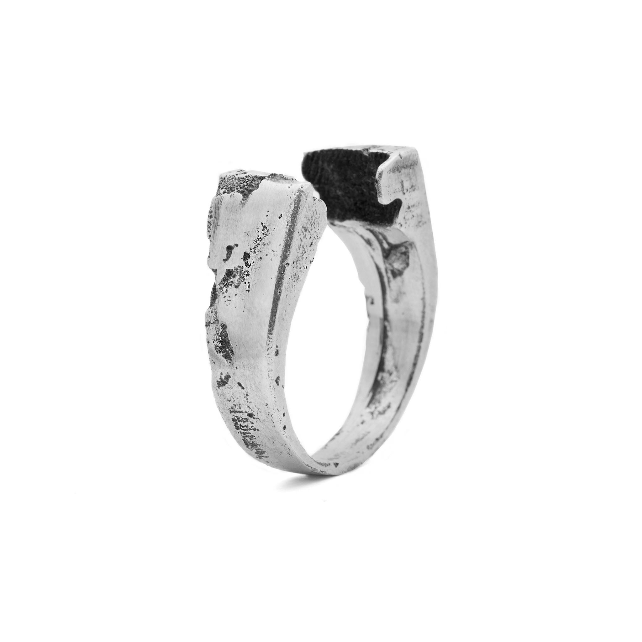 Geminga handcrafted sterling silver open signet ring with fractured textured design, made in Berlin jewelry studio.