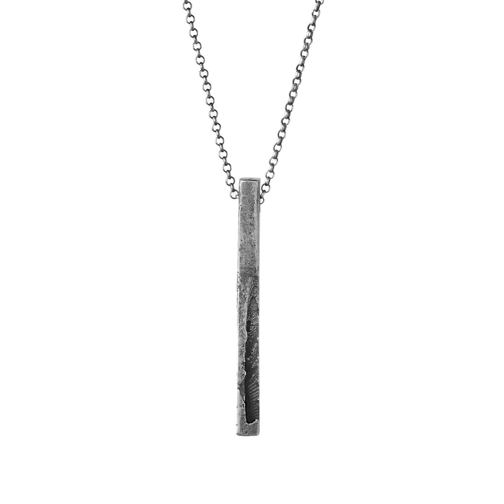 Handcrafted sterling silver monolith pendant necklace with a sculptural textured bar pendant