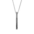 Handcrafted sterling silver monolith pendant necklace with a sculptural textured bar pendant