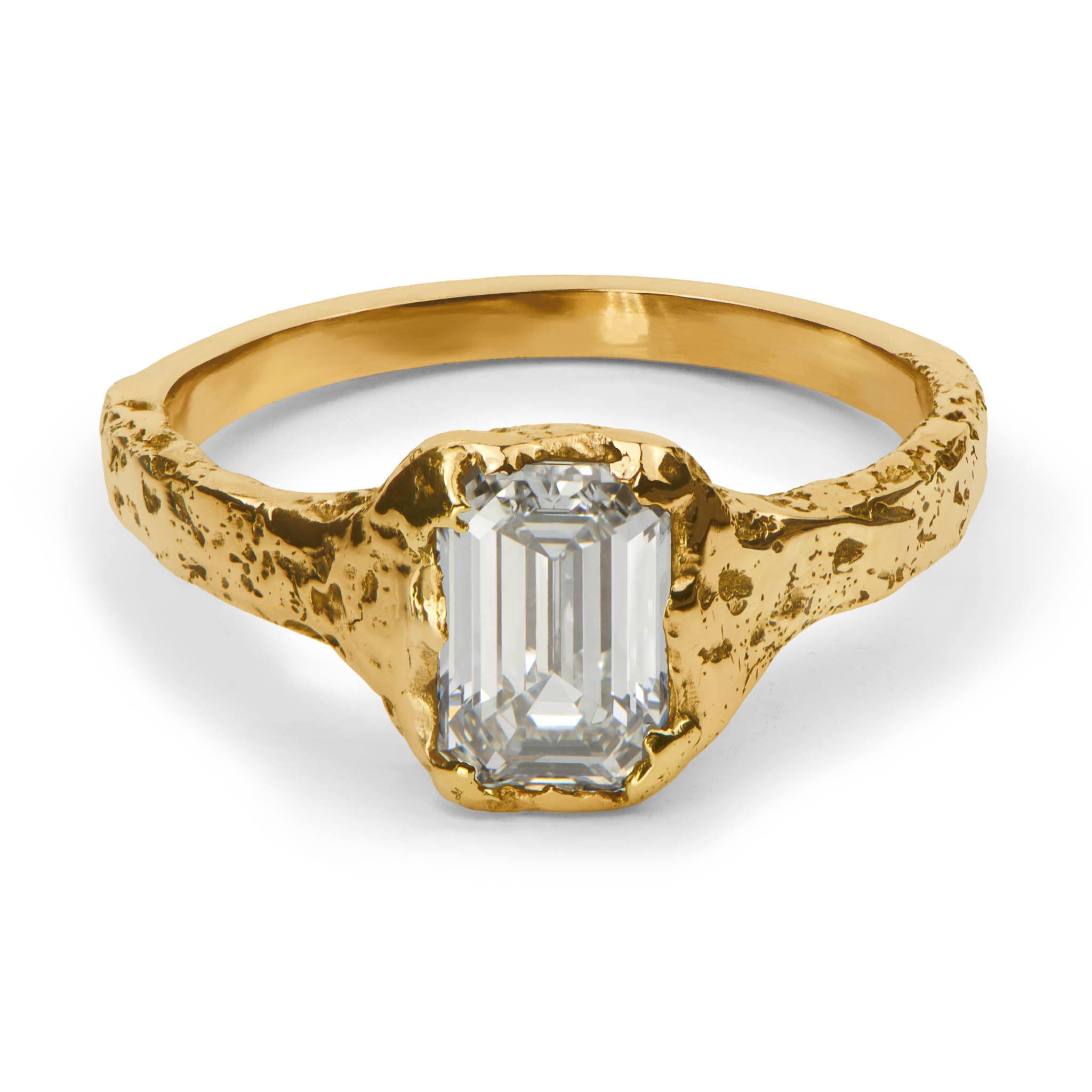 Yellow gold ring with a 1,54 ct emerald cut diamond on a white background