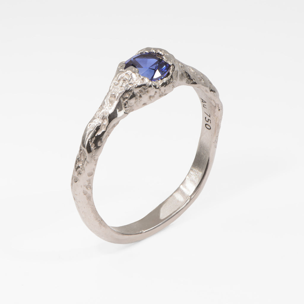 Organic white gold sapphire ring featuring a brilliant blue sapphire, contemporary alternative engagement ring with natural sculptural design
