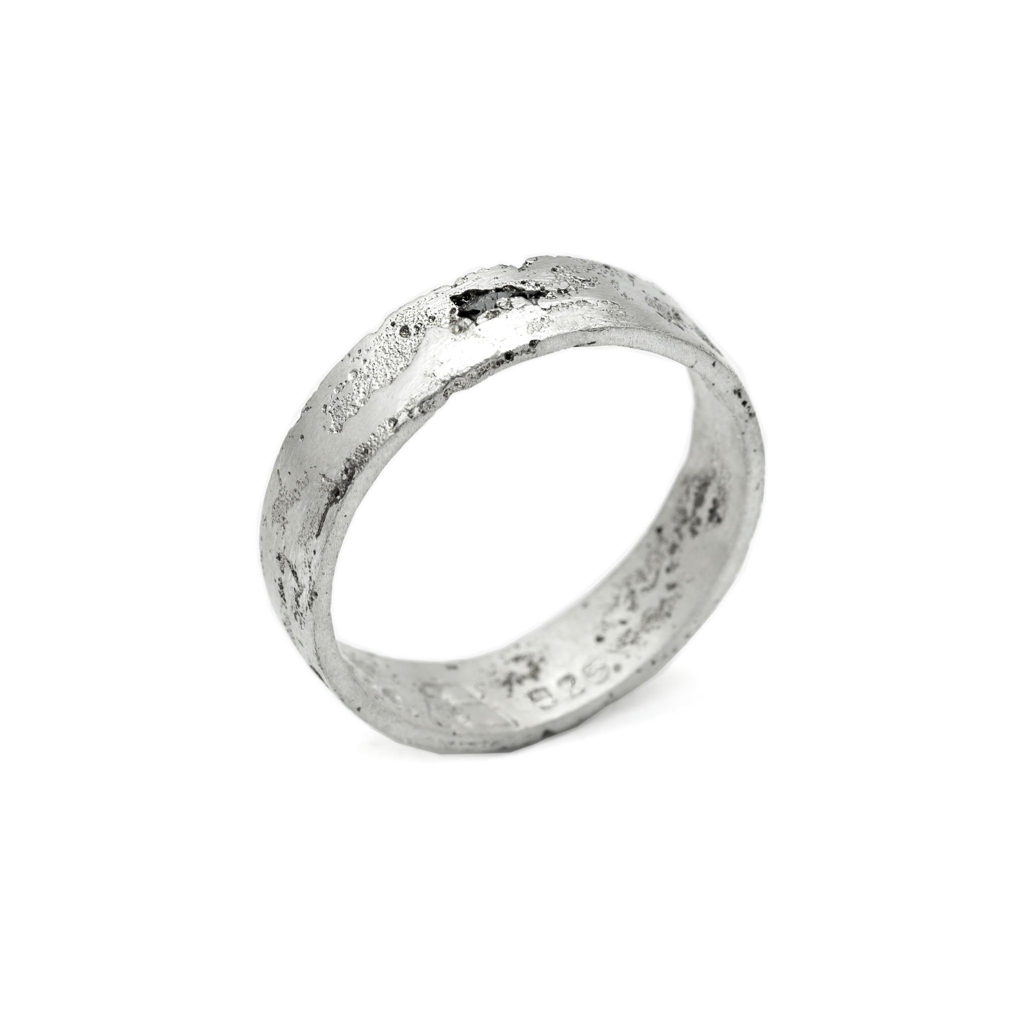 Kaewkosin ring in sterling silver with a black moissanite, artisan handcrafted jewelry featuring an organic textured surface and polshid interior