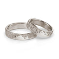 Wedding Bands in white gold with a sand like texture handcrafted in Berlin.