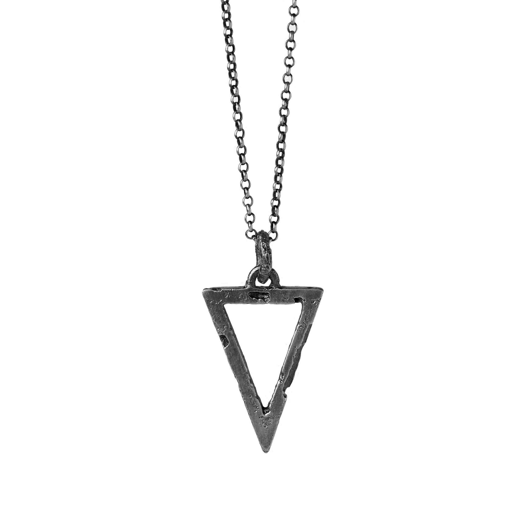 Oxidised sterling silver triangle pendant with an eroded finish suspended from a sterling silver chain.