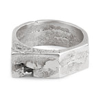 Geometric sterling silver ring with a brutalist design and a raw texture, handcrafted in our Berlin jewelry studio.