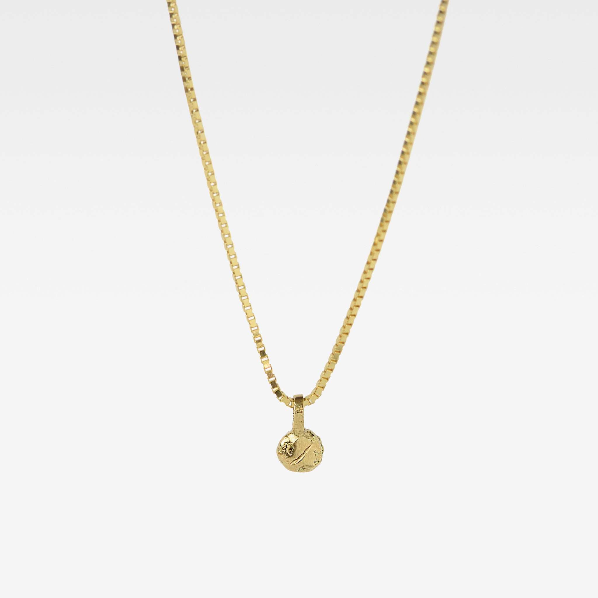 Gold Charm Necklace With Blue Sapphire