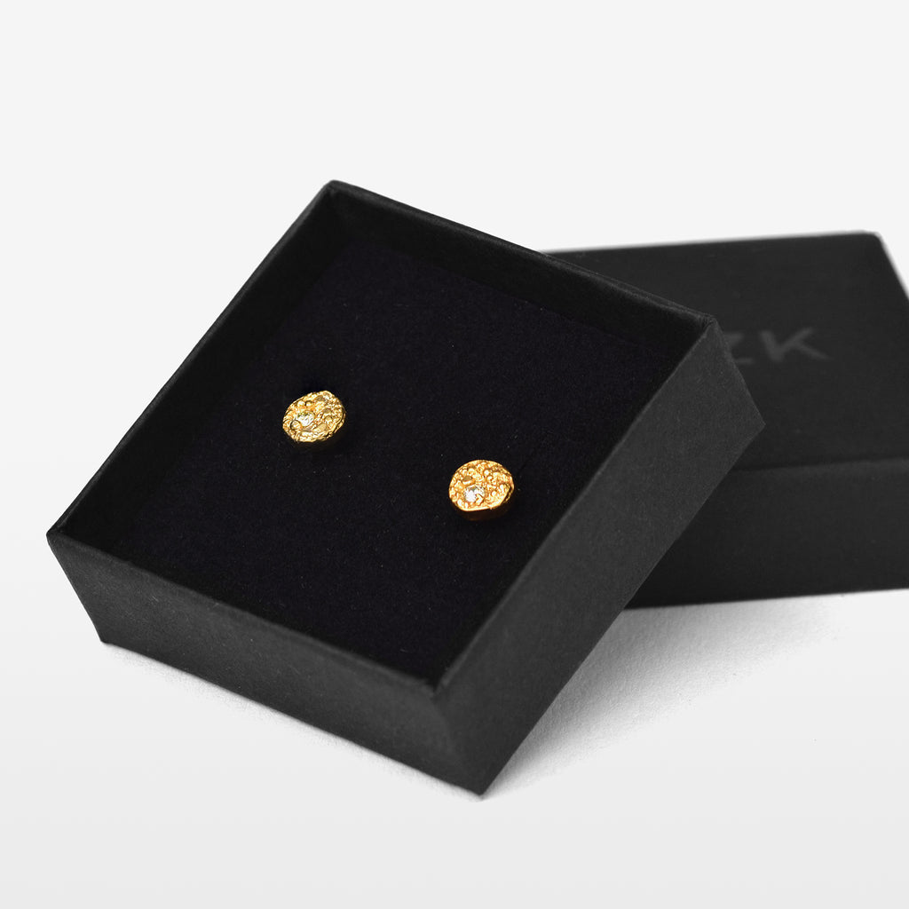 Gold Plated Stud Earrings With A Moissanite