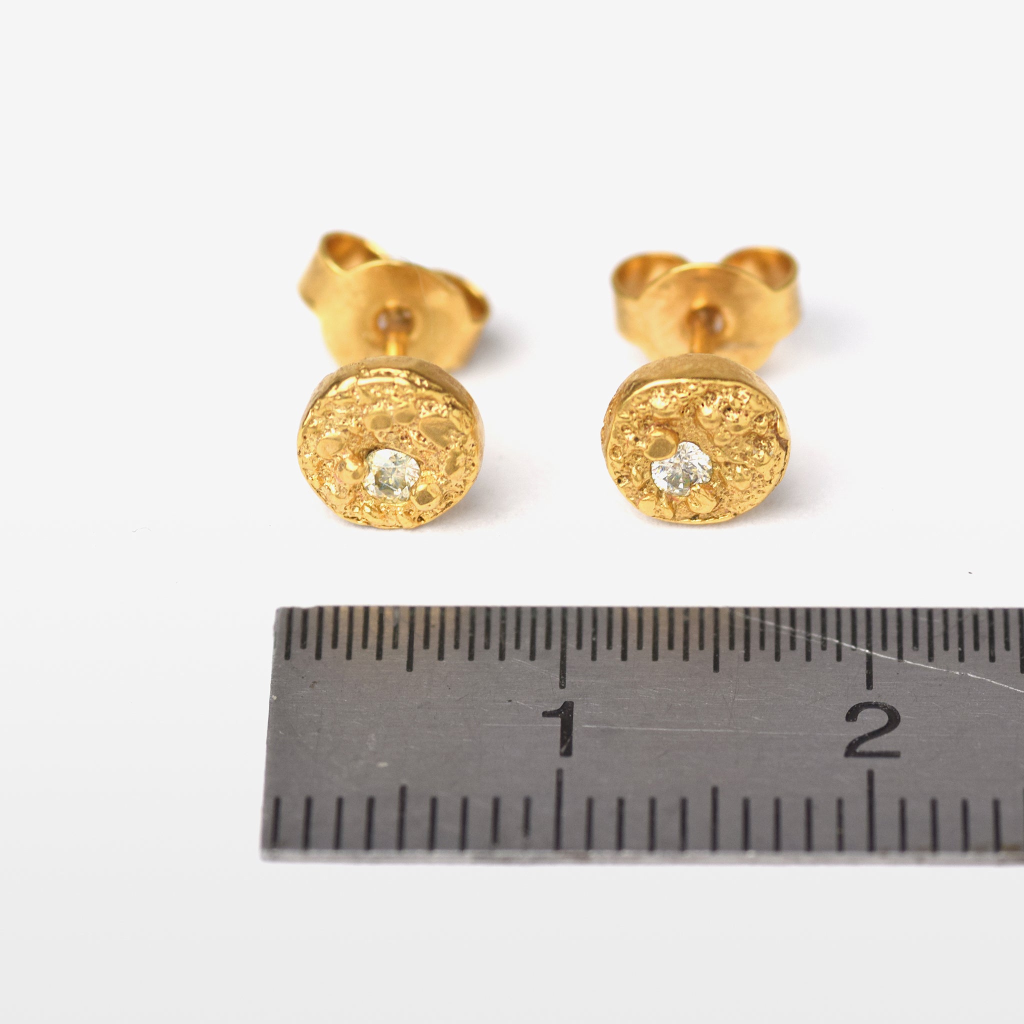 Gold Plated Stud Earrings With A Moissanite